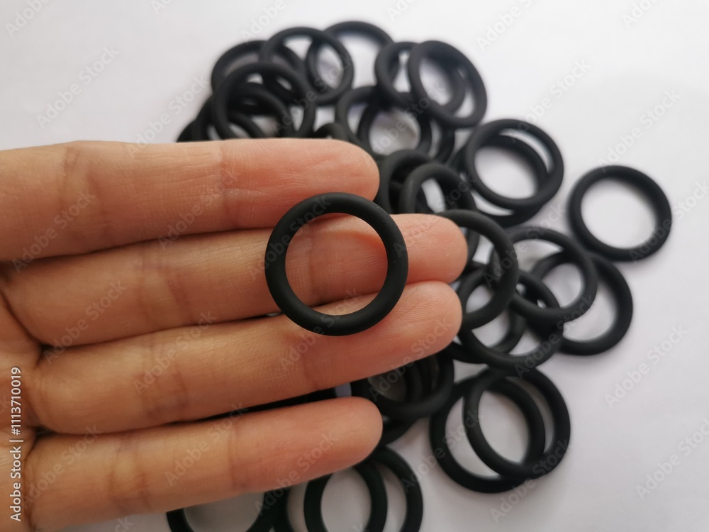O-ring made of VITON and Black color, Heat resistant, Illustration, Engineering part of the machine. Advertisements, ads, book, Silicone. Spare parts, Factory and Industry. O-ring made of VITON and Black color, Heat resistant, Illustration, Engineering part of the machine. Advertisements, ads, book, Silicone. Spare parts, Factory and Industry.