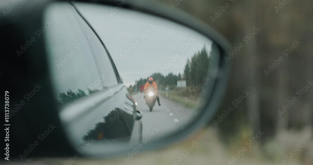 A motorcyclist navigates Sweden's autumn streets, taking sharp turns and leaning low, surrounded by vibrant fall foliage and winding scenic roads. A motorcyclist navigates Sweden's autumn streets, taking sharp turns and leaning low, surrounded by vibrant fall foliage and winding scenic roads.