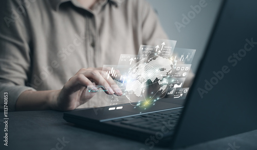 Man using laptop to analyze world global business economy. Concept of digital investment, analysis graph chart of financial growth, marketing network strategy, trading stock, future exchange market.