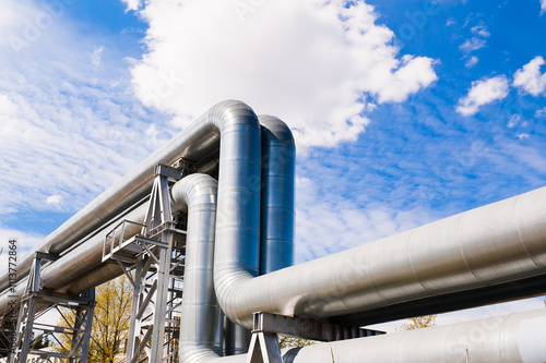 pipeline line close-up against blue sky and clouds photo