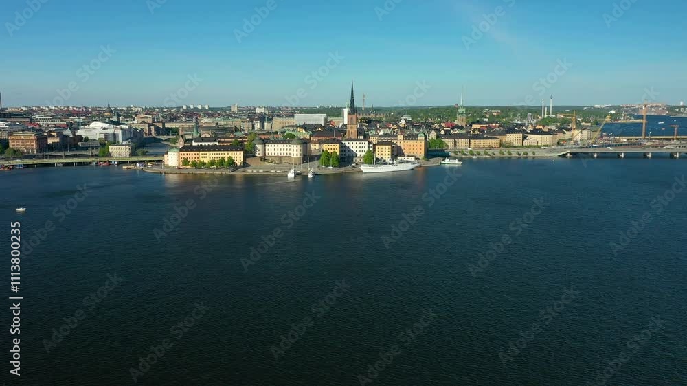 Camera panning over stockholm city center with riddarholmen church Camera panning over stockholm city center with riddarholmen church