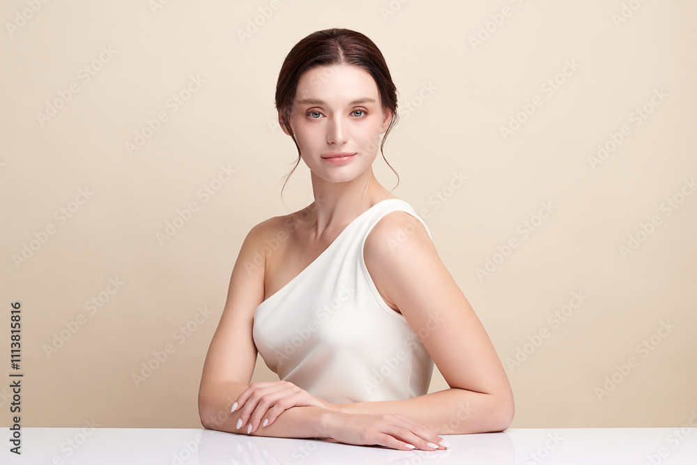 Beautiful young woman with clean fresh skin on beige background, Face care, Facial treatment, Cosmetology, beauty and spa, women portrait. Beautiful young woman with clean fresh skin on beige background, Face care, Facial treatment, Cosmetology, beauty and spa, women portrait.