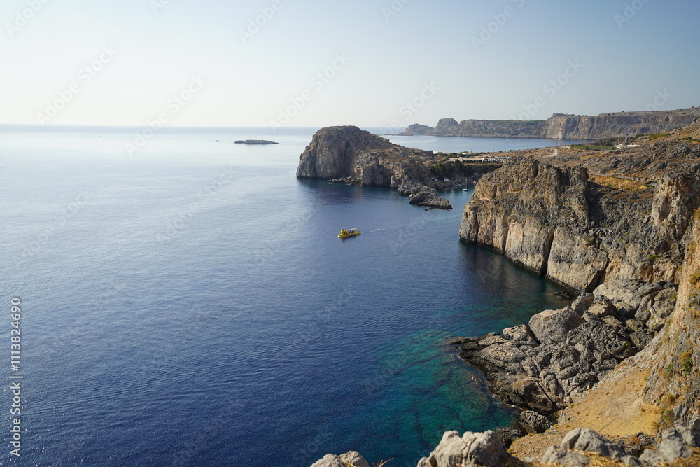 steep rocky cliffs around the acropolis of Lindos steep rocky cliffs around the acropolis of Lindos