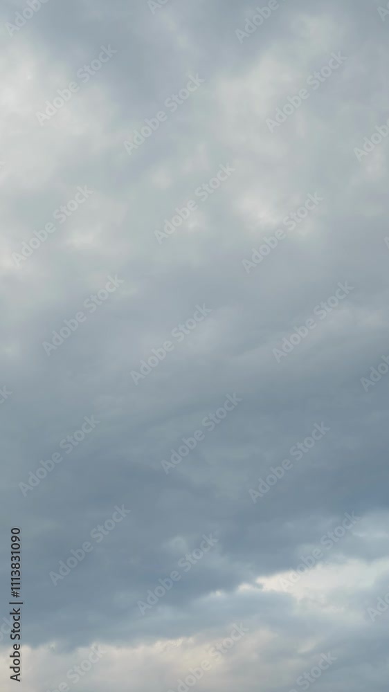 Cloudscape. Time lapse of fast moving fluffy clouds in blue sky. Vertical video Cloudscape. Time lapse of fast moving fluffy clouds in blue sky. Vertical video