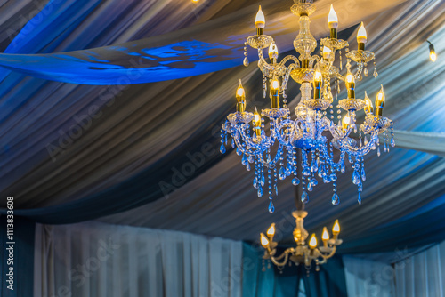 Foto chandelier with crystal glass, Beautiful wedding chandelier decoration on the wedding day, beautiful luxury chandelier in the restaurant, beautiful wedding decoration in the interior