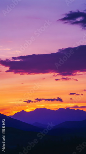 Silhouetted mountains against a deep orange and purple sunset, with clouds gently moving across the colorful sky Valentine's day vertical social media concept, photo footage stories reels