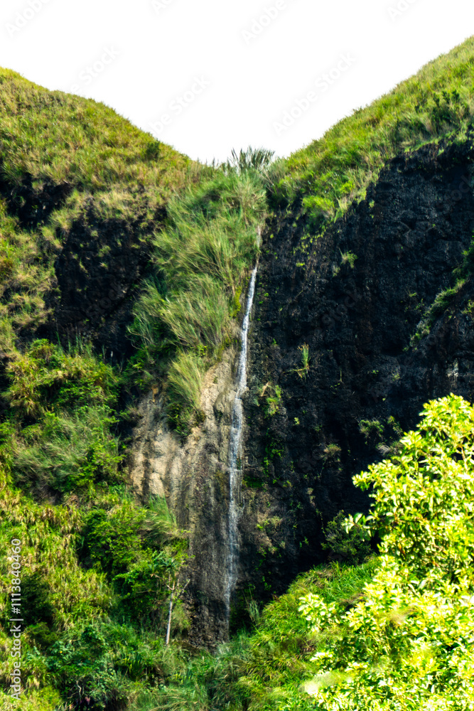 Discovering a hidden waterfall during a Guam road trip adventure Discovering a hidden waterfall during a Guam road trip adventure