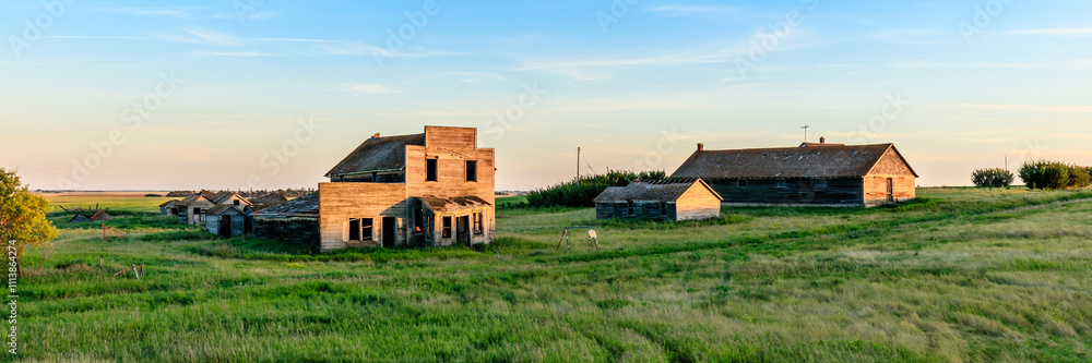 A rural scene with a few old buildings A rural scene with a few old buildings