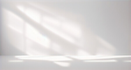 Soft shadow and light from windows on white wall. Minimal abstract light gray background for product presentation.