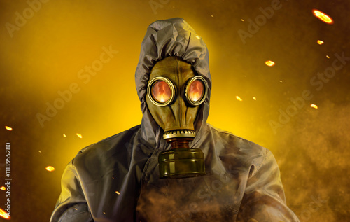 A man in a gas mask and protective suit. Nuclear explosion concept. Dirty air with dust and noise, grunge effect. photo