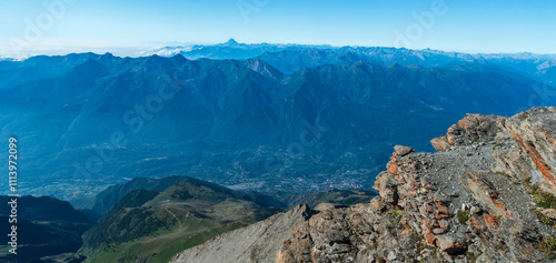 Val di Susa valley with Cottian Alps above from Rocciamelone mountain peak in Graian Alps in Italy photo