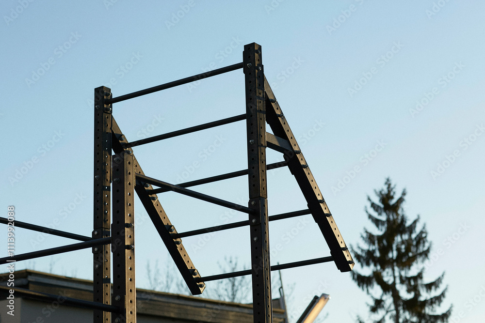Modern metal climbing frame in a public recreational area, Berlin, Germany Modern metal climbing frame in a public recreational area, Berlin, Germany
