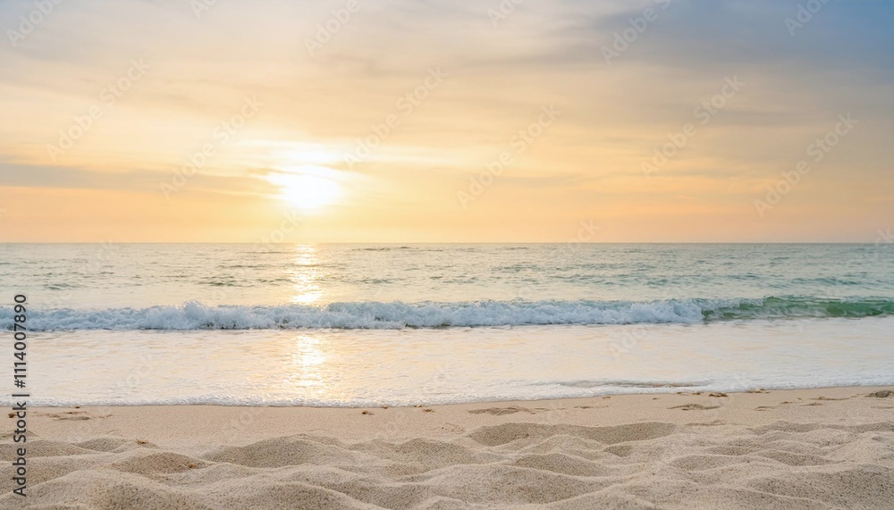 Obraz premium Turquoise Ocean Against Sandy Beach Under Yellow Sky