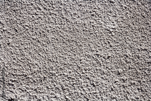 Rough rendered construction exterior full frame white painted wall texture background