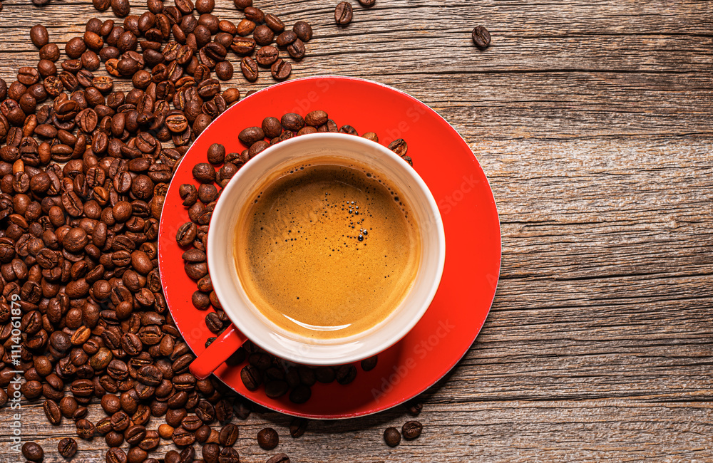 A cup of aromatic coffee on a wooden table.