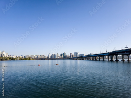 Wallpaper Mural panorama view of the river, Yeouido Hangang River Park, in Seoul, Korea, with a broad bridge, and a cityscape in the backdrop	
 Torontodigital.ca