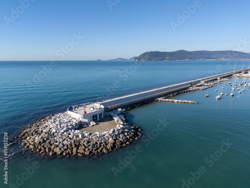Aerial view of the new waterfront built on the breakwater of the commercial port of Marina di Carrara, in Tuscany