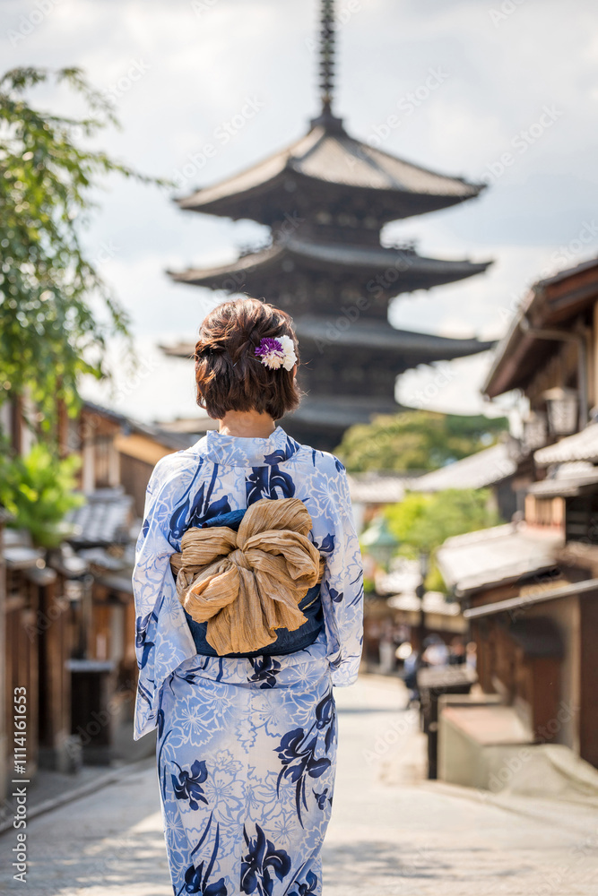 Woman wearing Yukata Kimono in Kyoto, Japan. Japanese traditional background. Woman wearing Yukata Kimono in Kyoto, Japan. Japanese traditional background.
