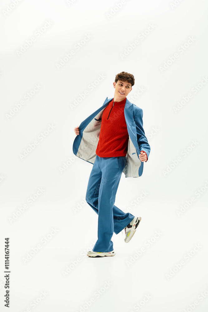 Charismatic person strikes a playful pose in a trendy outfit, radiating confidence. Charismatic person strikes a playful pose in a trendy outfit, radiating confidence.