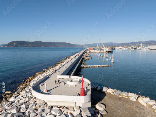 Aerial view of the new waterfront built on the breakwater of the commercial port of Marina di Carrara, in Tuscany