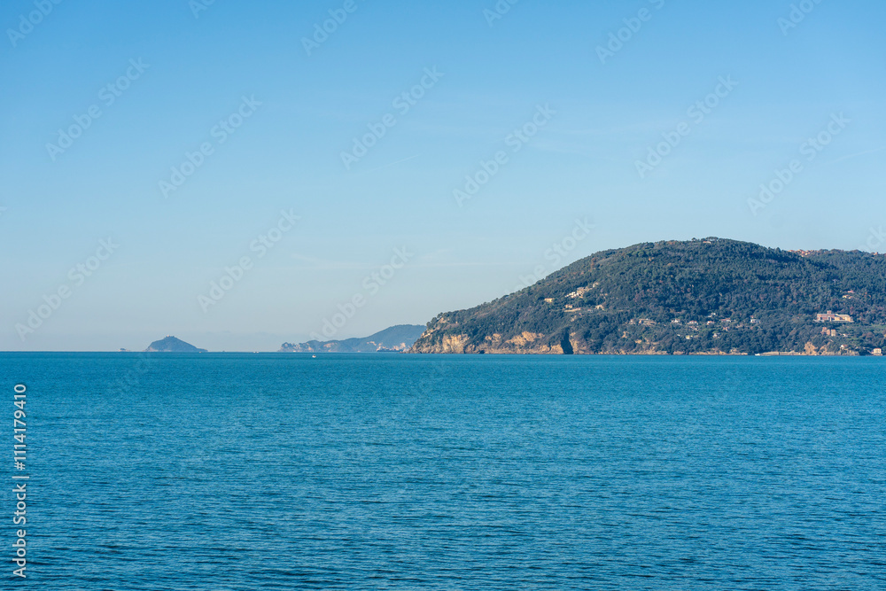 Punta Corvo and Tino Island, the southernmost part of Liguria seen from the new waterfront of Marina di Carrara Punta Corvo and Tino Island, the southernmost part of Liguria seen from the new waterfront of Marina di Carrara