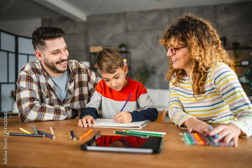 Mum and dad help their son to draw, enjoy creative hobby at home Mum and dad help their son to draw, enjoy creative hobby at home
