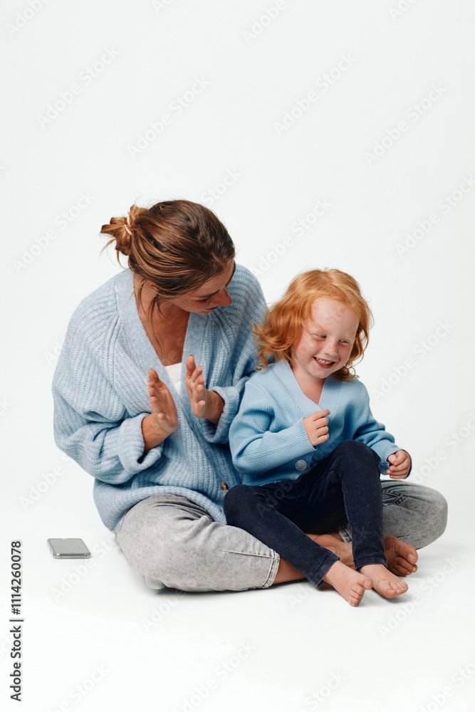 Mother and daughter embracing each other in a cozy home setting with love and affection Mother and daughter embracing each other in a cozy home setting with love and affection