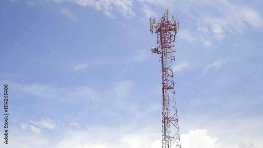 A telecommunication tower in the background a blue sky A telecommunication tower in the background a blue sky