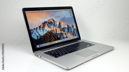 MacBook Pro with Stunning Mountain Landscape Wallpaper