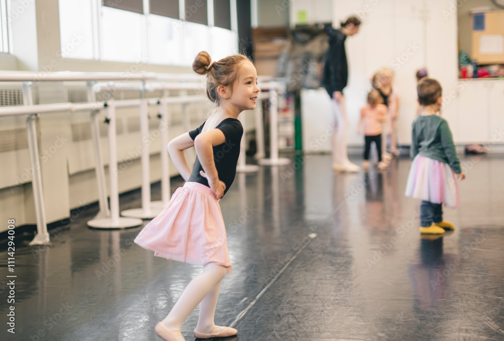 Cute little ballerina having fun on ballet room Cute little ballerina having fun on ballet room