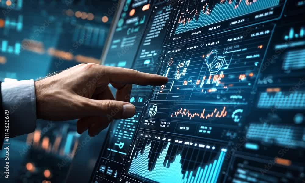 A businessman's hand reaches out to touch a futuristic digital screen displaying charts and graphs. A businessman's hand reaches out to touch a futuristic digital screen displaying charts and graphs.