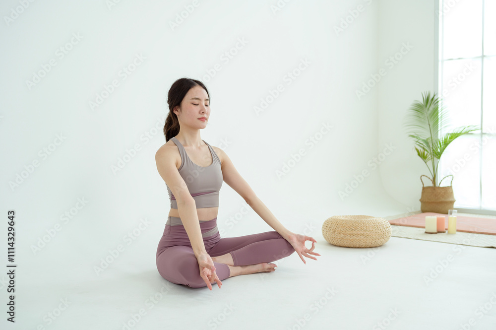 Asian woman in sportswear exercising and doing yoga Asian woman in sportswear exercising and doing yoga