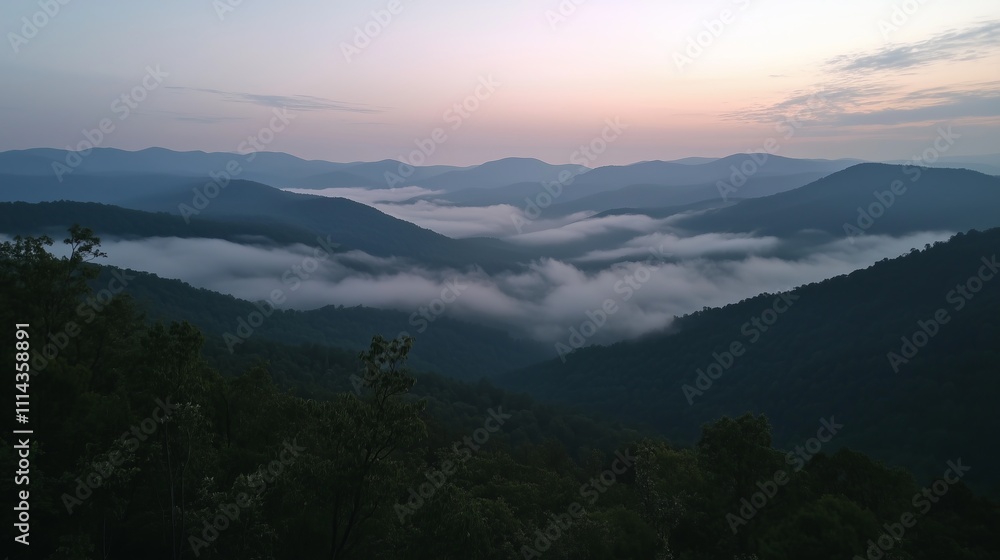 Fototapeta premium Breathtaking Foggy Mountain Range Showcasing Layers of Peaks Fading into the Horizon, Perfect for Travel and Nature Enthusiasts
