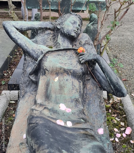 DONNA DORMIENTE SU TOMBA, CIMITERO MONUMENTALE DI MILANO photo