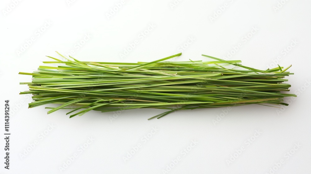 Fresh green chives arranged neatly on a white background, showcasing their long, slender shape and vibrant color. Fresh green chives arranged neatly on a white background, showcasing their long, slender shape and vibrant color.