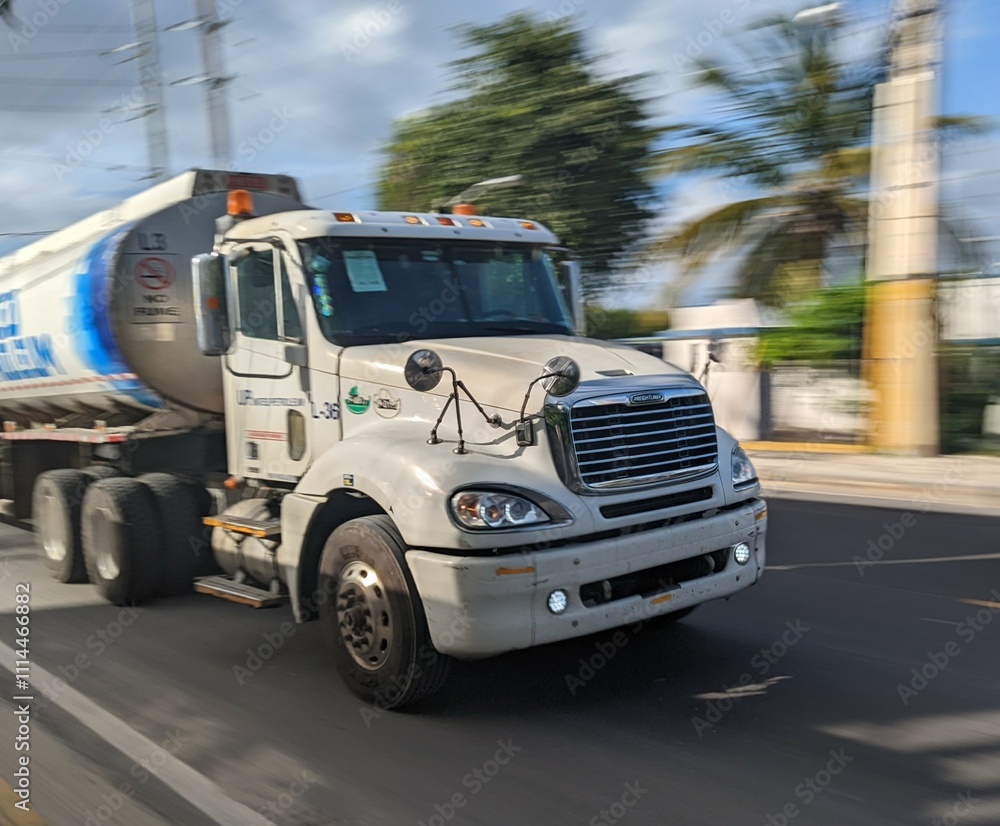 White truck on the asphalt road White truck on the asphalt road