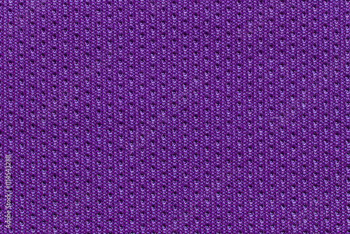 Detailed close up of vibrant purple textile fabric with texture and patterns. photo