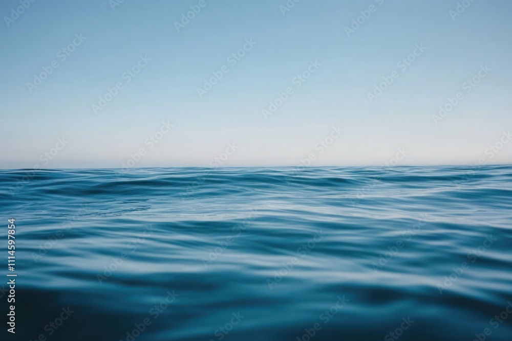 Fototapeta premium Serene Ocean Waves Under A Clear Blue Sky