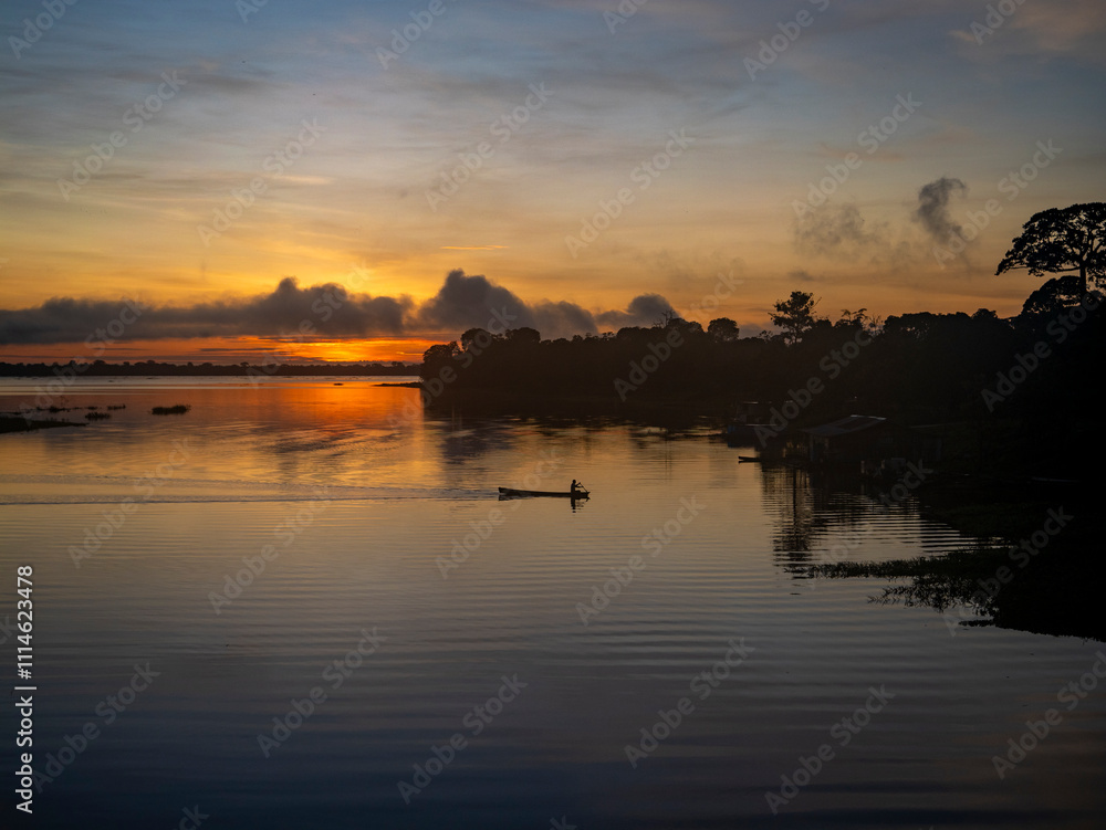 Morning atmosphere and sunrise on the Amazon east of Tefé. Morning atmosphere and sunrise on the Amazon east of Tefé.