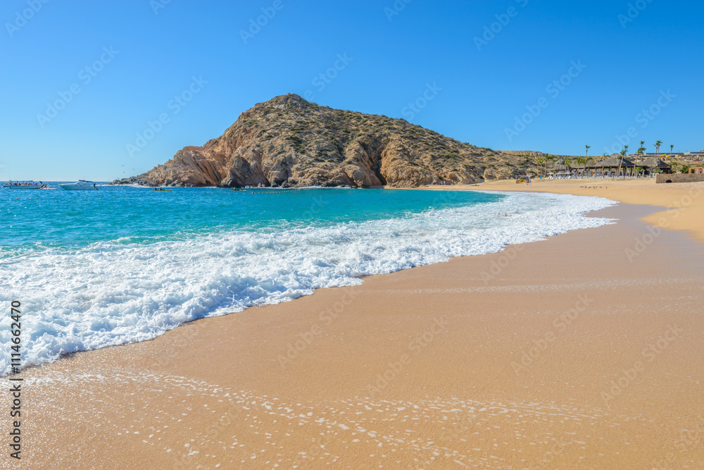 Santa Maria Beach, Cabo San Lucas, Mexico. Different stages of the fantastic ocean waves. Rocky and sandy beach. Santa Maria Beach, Cabo San Lucas, Mexico. Different stages of the fantastic ocean waves. Rocky and sandy beach.