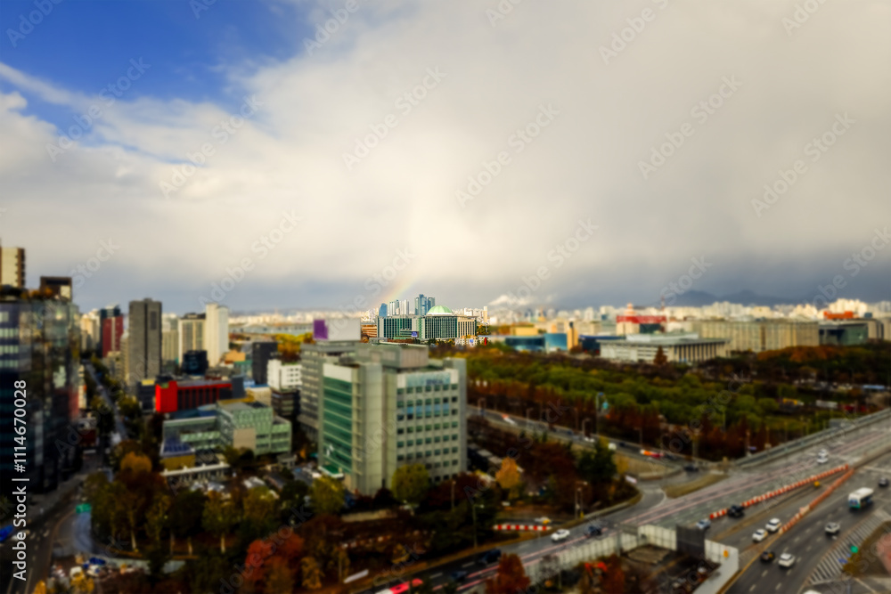 Naklejka premium After Rain Landscape with Rainbow over The Korean National Assembly Building, Symbol of Democracy in Seoul, Korea, in 2024 