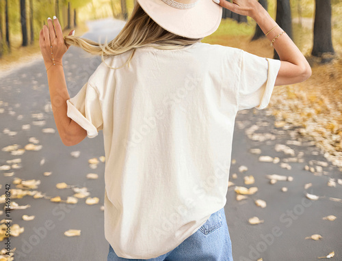 Girl in template blank back soft cream t-shirt street background. Back Tshirt design. ( Only background modified with AI ). Empty Back sand tshirt Design Presentation