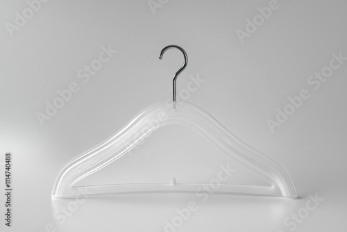 White plastic clothes hanger isolated on a plain white background