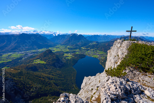 A cross from the top of the mountain Trisselwand. Beautiful landscape. Styria region, Bad Aussee, Austria. photo