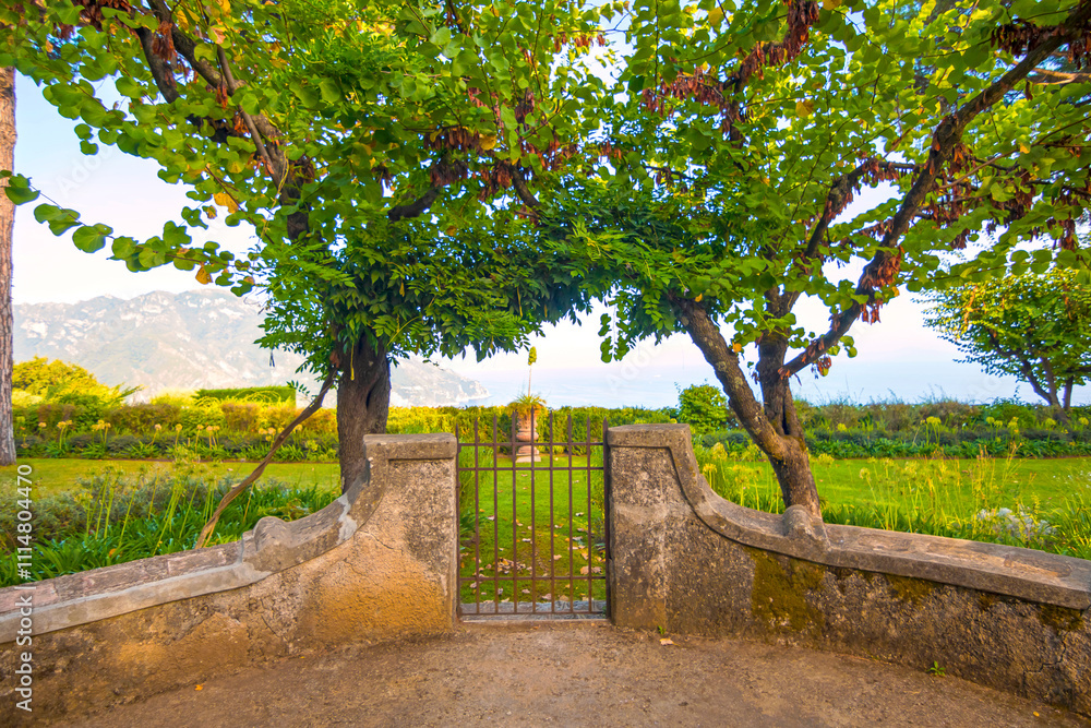 The photo showcases the scenic villas of Ravello and its surroundings, set atop cliffs with panoramic views, lush gardens, and charming architecture that capture the essence of Italy’s Amalfi Coast.