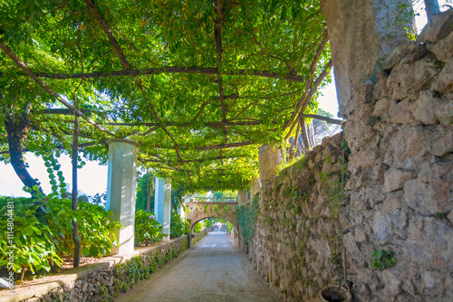 Obraz na płótnie The photo showcases the scenic villas of Ravello and its surroundings, set atop cliffs with panoramic views, lush gardens, and charming architecture that capture the essence of Italy’s Amalfi Coast. w salonie