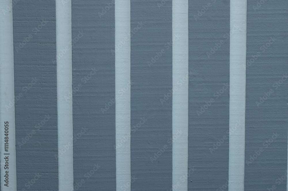 Obraz premium Grey Wooden Wall with White Facades.