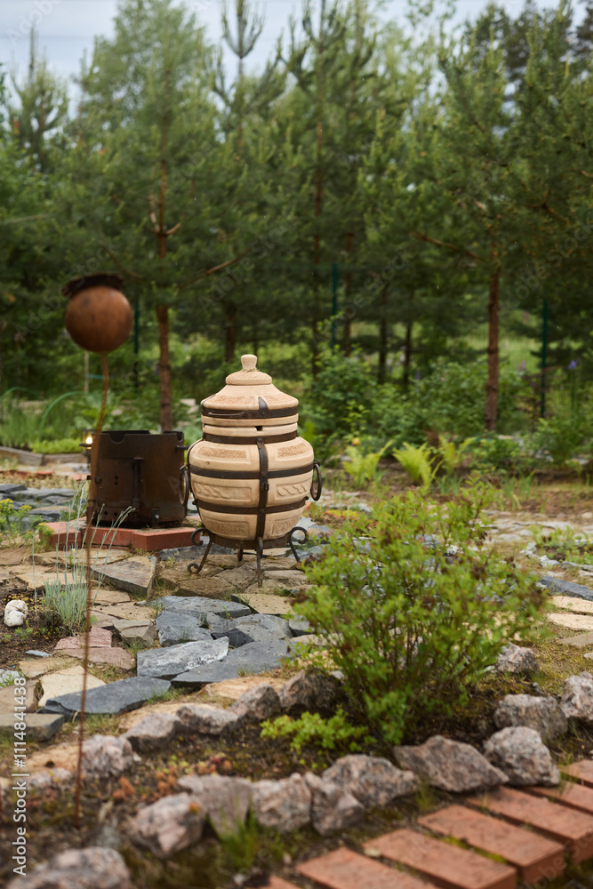 Naklejka premium A Serene and Tranquil Garden Featuring Unique Decor Along with Beautiful Natural Elements