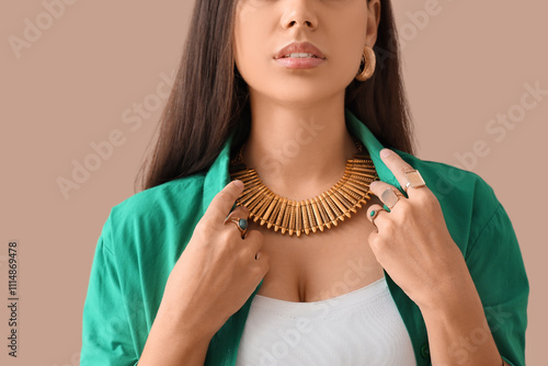 Stylish young woman in beau...