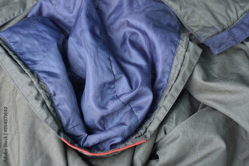 Obraz premium fabric texture of gray hood green wrinkled jacket